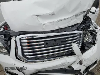 2019 GMC Yukon SLT with VIN 1GKS2BKC2KR338007, listed as a Copart auction lot 82336394 with 105,087 mi miles and Salvage Title. Bid and sale history available at carsss.com. Image 13.