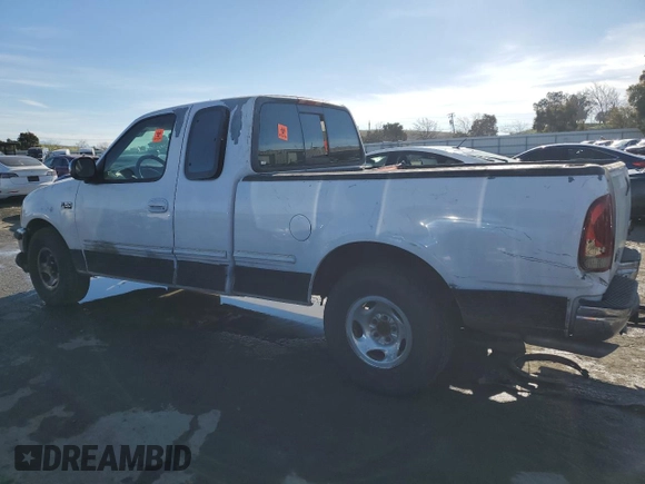 1997 Ford F-150 XL с VIN 1FTEX17L9VKB65855, выставлен на аукционе Copart как лот 87410414 с пробегом 198 005 миль миль и Списание • Salvage title. История ставок и продаж доступна на DreamBid. Изображение 2.