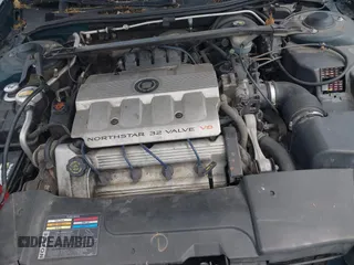 1999 Cadillac DeVille DHS z VIN 1G6KE54Y9XU766791, wystawiony jako IAAI lot #42005553 z przebiegiem 140 515 mil mil oraz . Historia ofert i sprzedaży dostępna na DreamBid. Obrazek 10.