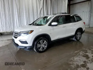 2018 Honda Pilot EX-L with VIN 5FNYF6H58JB040611, listed as a Copart auction lot 63614525 with 148,656 mi miles and Salvage title. Bid and sale history available at DreamBid. Image 1.
