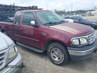 1999 Ford F-150 with VIN 1FTRX17W2XNB98256, listed as a IAAI auction lot 41931497 with Not Provided miles and . Bid and sale history available at DreamBid. Image 13.