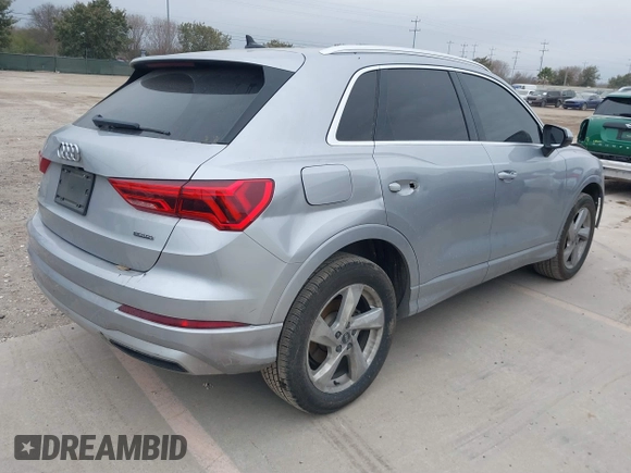 2021 Audi Q3 Premium with VIN WA1AUCF35M1066713, listed as a IAAI auction lot 41395334 with 82,724 mi miles and . Bid and sale history available at DreamBid. Image 4.