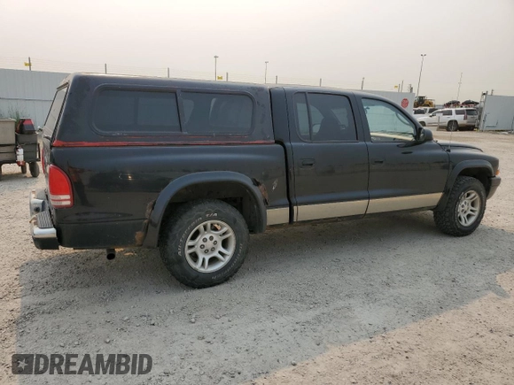 2003 Dodge Dakota Sport with VIN 1D7HL38N33S320813, listed as a Copart auction lot 63994944 with 269,006 mi miles and Salvage Title. Bid and sale history available at carsss.com. Image 3.