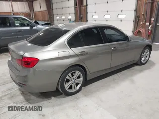 2017 BMW 3 Series 330i xDrive with VIN WBA8D9C32HA011795, listed as a IAAI auction lot 41789050 with 65,522 mi miles and . Bid and sale history available at DreamBid. Image 4.