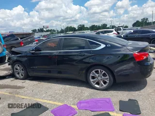 2014 Chevrolet Impala LT with VIN 1G1115SL5EU100447, listed as a IAAI auction lot 42604594 with 163,646 mi miles and . Bid and sale history available at DreamBid. Image 14.