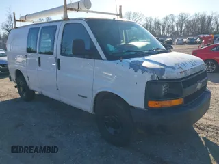 2006 Chevrolet Express Cargo Van with VIN 1GCGG25V261222987, listed as a IAAI auction lot 41738433 with 223,877 mi miles. Bid and sale history available at carsss.com. Image 1.