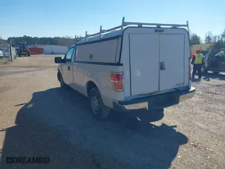 2014 Ford F-150 XL with VIN 1FTMF1CM3EKG42275, listed as a IAAI auction lot 41567171 with 187,849 mi miles. Bid and sale history available at carsss.com. Image 3.