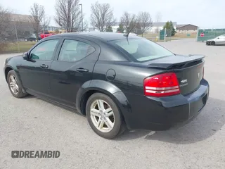 2009 Dodge Avenger SXT with VIN 1B3LC56B49N570157, listed as a IAAI auction lot 41796122 with 164,571 mi miles. Bid and sale history available at carsss.com. Image 3.