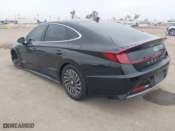 2021 Hyundai Sonata Hybrid SEL with VIN KMHL34JJ1MA024239, listed as a IAAI auction lot 41707290 with 165,214 mi miles. Bid and sale history available at carsss.com. Image 3.