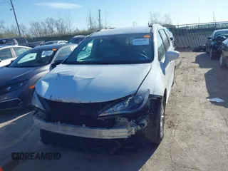 2017 Chrysler Pacifica Touring L with VIN 2C4RC1BG8HR677720, listed as a IAAI auction lot 41976606 with 170,175 mi miles and . Bid and sale history available at DreamBid. Image 13.