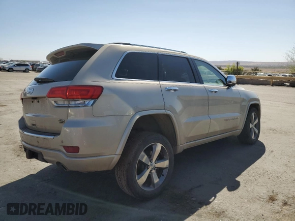 2015 Jeep Grand Cherokee Overland with VIN 1C4RJFCT5FC913728, listed as a Copart auction lot 51605375 with 180,452 mi miles and Salvage Title. Bid and sale history available at carsss.com. Image 3.