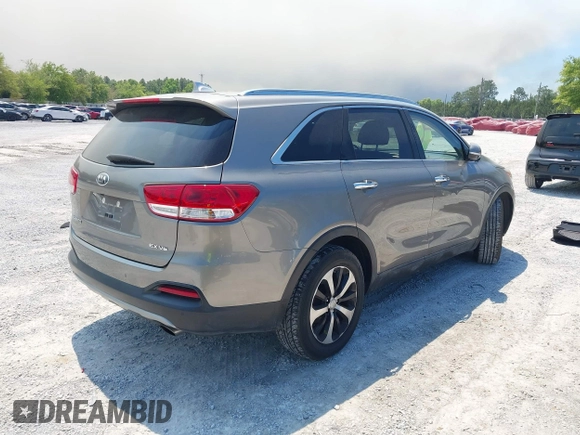 2018 Kia Sorento EX z VIN 5XYPH4A57JG410055, wystawiony jako IAAI lot #42023771 z przebiegiem 53 984 mil mil oraz . Historia ofert i sprzedaży dostępna na DreamBid. Obrazek 4.