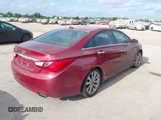 2012 Hyundai Sonata 2.4L Limited PZEV with VIN 5NPEC4AC4CH386426, listed as a IAAI auction lot 42036754 with 216,619 mi miles. Bid and sale history available at carsss.com. Image 4.