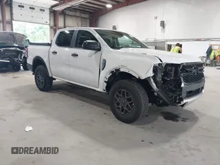 2024 Ford Ranger XLT with VIN 1FTER4HH5RLE06686, listed as a IAAI auction lot 42633664 with 1,969 mi miles and . Bid and sale history available at DreamBid. Image 1.
