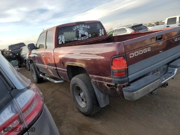2000 Dodge Ram 1500 with VIN 3B7HF13Z9YG149645, listed as a Copart auction lot 87197624 with 244,846 mi miles and Salvage Title. Bid and sale history available at carsss.com. Image 2.