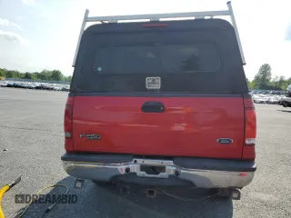 2003 Ford F-250 XL with VIN 1FTNX21L93EA90875, listed as a Copart auction lot 60304115 with 136,956 mi miles and Salvage title. Bid and sale history available at DreamBid. Image 6.