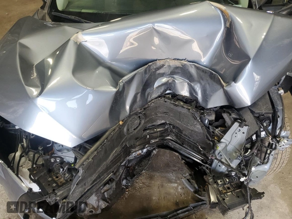 2023 Toyota Corolla Cross LE z VIN 7MUCAABG3PV046333, wystawiony jako Copart lot #52866215 z przebiegiem Nie podano mil oraz Szkoda całkowita • Salvage title. Historia ofert i sprzedaży dostępna na DreamBid. Obrazek 13.