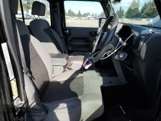 2009 Jeep Wrangler Unlimited X with VIN 1J4GZ39139L742349, listed as a Copart auction lot 46610165 with 57,652 mi miles and Salvage Title. Bid and sale history available at carsss.com. Image 7.