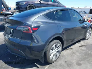 2024 Tesla Model Y Long Range z VIN 7SAYGDEE2RA233855, wystawiony jako IAAI lot #42148956 z przebiegiem 14 385 mil mil oraz . Historia ofert i sprzedaży dostępna na DreamBid. Obrazek 4.