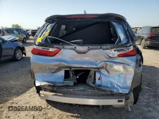 2019 Honda CR-V LX z VIN 2HKRW5H32KH421662, wystawiony jako Copart lot #52364655 z przebiegiem 108 182 mil mil oraz Szkoda całkowita • Salvage title. Historia ofert i sprzedaży dostępna na DreamBid. Obrazek 6.