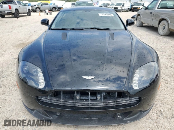 2015 Aston Martin Vantage z VIN SCFEBBAL2FGC18949, wystawiony jako Copart lot #54389965 z przebiegiem Nie podano mil oraz Szkoda całkowita • Salvage title. Historia ofert i sprzedaży dostępna na DreamBid. Obrazek 5.