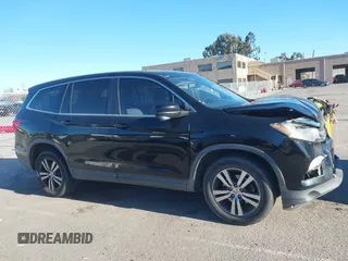 2018 Honda Pilot EX-L with VIN 5FNYF5H58JB013113, listed as a IAAI auction lot 41313206 with 125,825 mi miles. Bid and sale history available at carsss.com. Image 13.