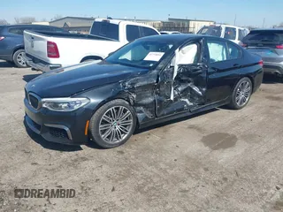 2019 BMW 5 Series M550i xDrive with VIN WBAJB9C51KB464879, listed as a IAAI auction lot 41774834 with 77,379 mi miles and . Bid and sale history available at DreamBid. Image 17.