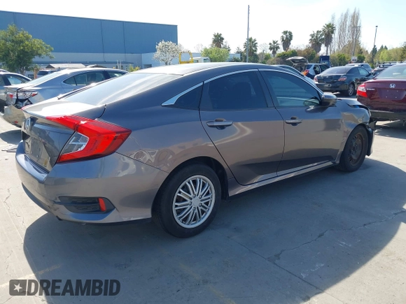 2016 Honda Civic Sedan LX with VIN 19XFC2F53GE213624, listed as a IAAI auction lot 41993834 with 112,052 mi miles. Bid and sale history available at carsss.com. Image 4.