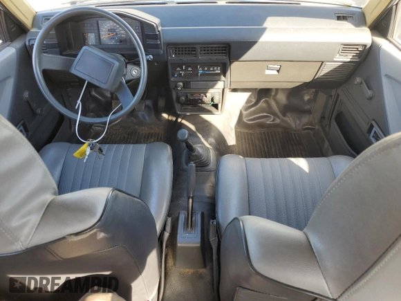 1986 Toyota Tercel z VIN JT2AL31G5G0429131, wystawiony jako Copart lot #79204554 z przebiegiem 124 477 mil mil oraz Szkoda całkowita • Salvage title. Historia ofert i sprzedaży dostępna na DreamBid. Obrazek 8.