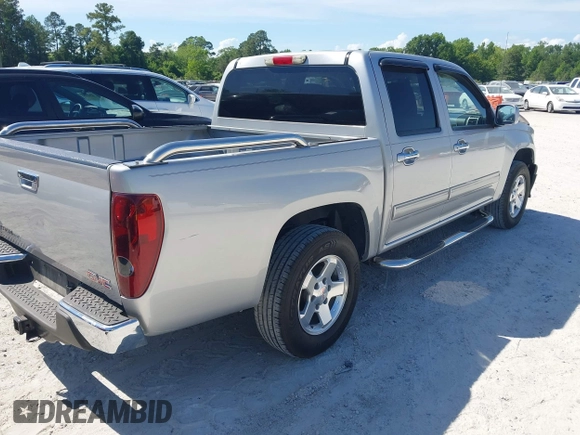 2012 GMC Canyon z VIN 1GCD5MFE3C8107823, wystawiony jako IAAI lot #42146540 z przebiegiem 100 063 mil mil oraz . Historia ofert i sprzedaży dostępna na DreamBid. Obrazek 4.