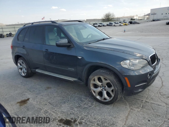 2013 BMW X5 xDrive35i z VIN 5UXZV4C54D0B14923, wystawiony jako Copart lot #50929385 z przebiegiem 249 533 mil mil oraz Tytuł czysty. Historia ofert i sprzedaży dostępna na DreamBid. Obrazek 4.
