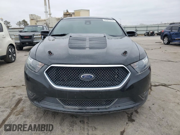 2014 Ford Taurus SHO with VIN 1FAHP2KT4EG116744, listed as a Copart auction lot 44947915 with 138,757 mi miles and Clean Title. Bid and sale history available at carsss.com. Image 5.