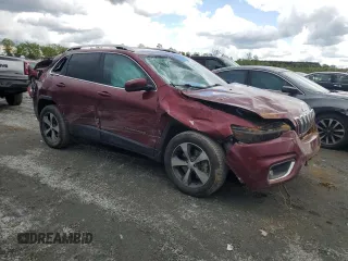 2019 Jeep Cherokee Limited with VIN 1C4PJMDX8KD218158, listed as a Copart auction lot 52881615 with 105,303 mi miles and Salvage Title. Bid and sale history available at DreamBid. Image 4.