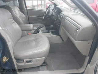 2002 Jeep Grand Cherokee Laredo with VIN 1J4GW48S22C244433, listed as a IAAI auction lot 41892912 with 256,393 mi miles. Bid and sale history available at carsss.com. Image 5.
