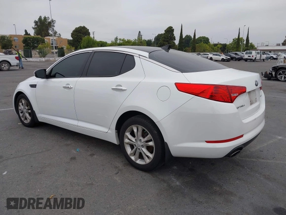 2013 Kia Optima EX z VIN 5XXGN4A75DG099762, wystawiony jako IAAI lot #42443408 z przebiegiem 110 189 mil mil oraz . Historia ofert i sprzedaży dostępna na DreamBid. Obrazek 3.
