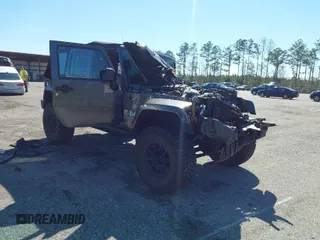 2018 Jeep Wrangler Unlimited Rubicon Recon with VIN 1C4HJWFG1JL840294, listed as a IAAI auction lot 41775967 with 108,241 mi miles and . Bid and sale history available at DreamBid. Image 1.