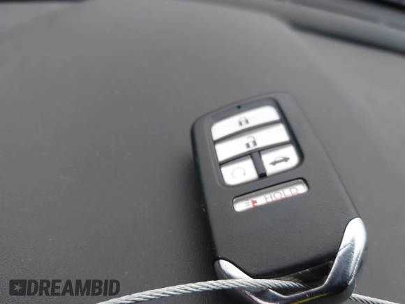 2019 Honda Civic Sport with VIN 2HGFC2F80KH538093, listed as a IAAI auction lot 42093863 with 63,349 mi miles and . Bid and sale history available at DreamBid. Image 11.