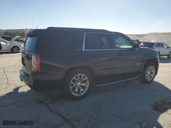 2016 GMC Yukon SLT with VIN 1GKS2BKC2GR251876, listed as a Copart auction lot 77204944 with 111,099 mi miles and Salvage Title. Bid and sale history available at carsss.com. Image 3.