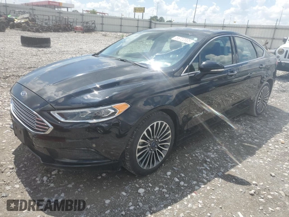 2018 Ford Fusion SE z VIN 3FA6P0LU6JR273861, wystawiony jako Copart lot #55722005 z przebiegiem 127 633 mil mil oraz Szkoda całkowita • Salvage title. Historia ofert i sprzedaży dostępna na DreamBid. Obrazek 1.