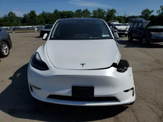 2024 Tesla Model Y Long Range с VIN 7SAYGDEE2RA257279, выставлен на аукционе Copart как лот 61248255 с пробегом Не указан миль и Списание • Salvage title. История ставок и продаж доступна на DreamBid. Изображение 5.