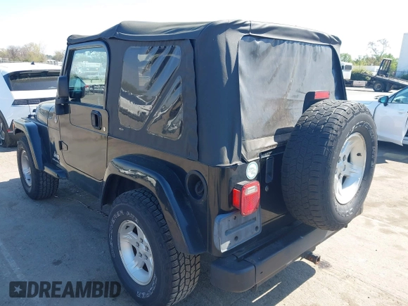2005 Jeep Wrangler X with VIN 1J4FA39S35P372731, listed as a IAAI auction lot 41875121 with 146,034 mi miles and . Bid and sale history available at DreamBid. Image 3.