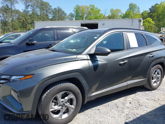 2022 Hyundai Tucson SEL with VIN 5NMJB3AEXNH144592, listed as a IAAI auction lot 42037487 with 75,651 mi miles and . Bid and sale history available at DreamBid. Image 14.