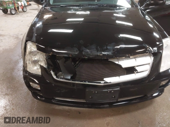 2005 Cadillac STS with VIN 1G6DW677450156901, listed as a IAAI auction lot 41653553 with 125,150 mi miles. Bid and sale history available at carsss.com. Image 6.