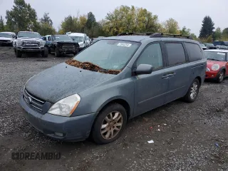 2006 Kia Sedona LX with VIN KNDMB233566097439, listed as a Copart auction lot 77644254 with 124,158 mi miles and Clean Title. Bid and sale history available at carsss.com. Image 1.