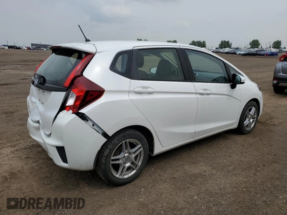 2016 Honda Fit LX with VIN JHMGK5H59GX004764, listed as a Copart auction lot 65131715 with 75,726 mi miles and Salvage title. Bid and sale history available at DreamBid. Image 3.