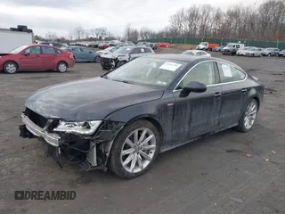 2014 Audi A7 3.0 Prestige with VIN WAU2GAFC5EN071911, listed as a IAAI auction lot 41453159 with 120,569 mi miles. Bid and sale history available at carsss.com. Image 2.