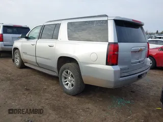 2017 Chevrolet Suburban LT with VIN 1GNSKHKC2HR240545, listed as a IAAI auction lot 41571093 with 33,933 mi miles. Bid and sale history available at carsss.com. Image 3.