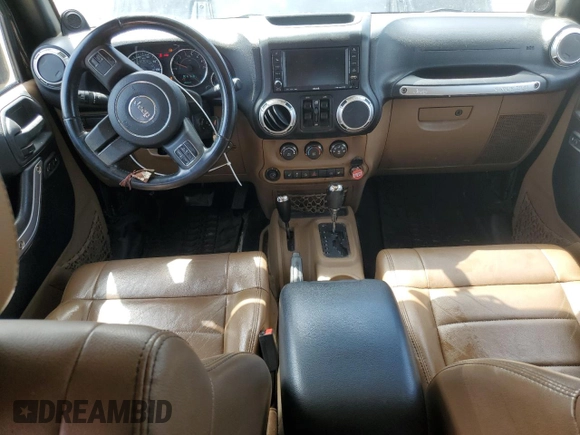 2011 Jeep Wrangler Unlimited Rubicon with VIN 1J4BA6H16BL561658, listed as a Copart auction lot 58379755 with 103,587 mi miles and Salvage title. Bid and sale history available at DreamBid. Image 8.