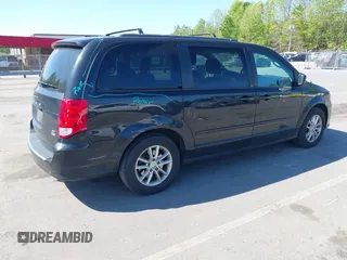 2014 Dodge Grand Caravan SXT with VIN 2C4RDGCG4ER341699, listed as a IAAI auction lot 42064523 with 234,422 mi miles and . Bid and sale history available at DreamBid. Image 4.