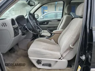 2006 GMC Envoy SLT with VIN 1GKDS13S762258032, listed as a Copart auction lot 88677095 with 184,188 mi miles and Salvage Title. Bid and sale history available at carsss.com. Image 7.
